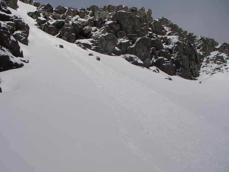 Snow sliding off the rocks had precipitated extensive 'sluffing' on SE slopes.