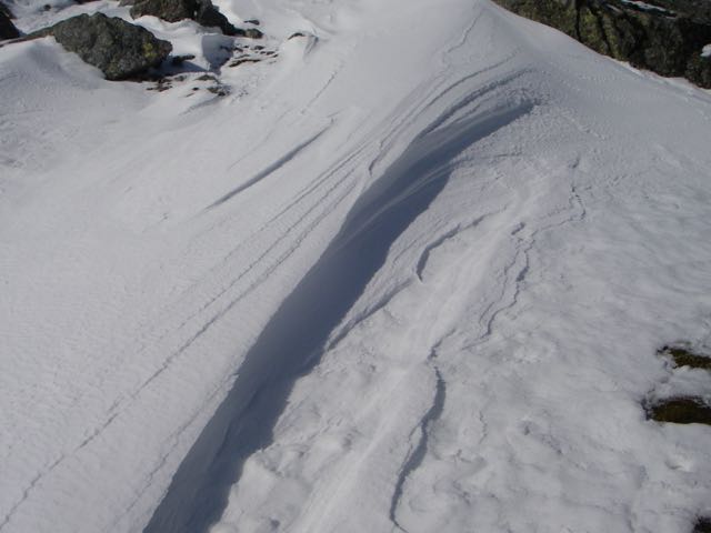 Beautiful sculptured snow drifts (notice the old snow surface in bottom right of photo)