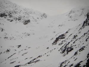 Deep unconsolidated snow accumulations in higher gullies and corries