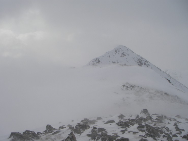 Spindrift blowing on Buachaille Etive Beag. Spot the group of walkers. 