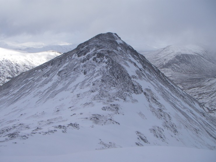 The S.W. flank of Stob Coire Raineach (925m.) is scoured to its summit.