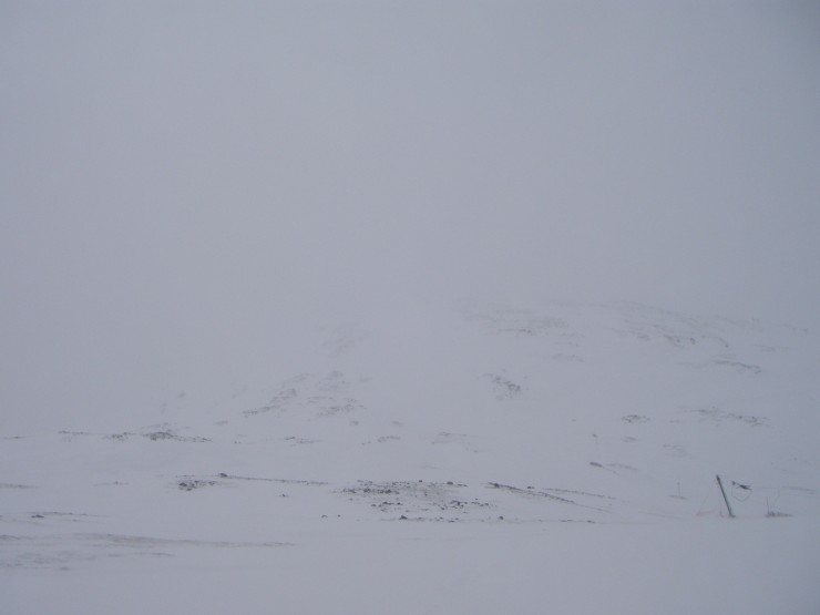 The NE flank of Meall a Bhuiridh glimpsed during a clearance in the visibility