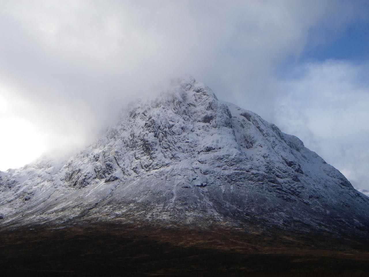 Mist clearing from round the summit of the Buachaille at mid-day