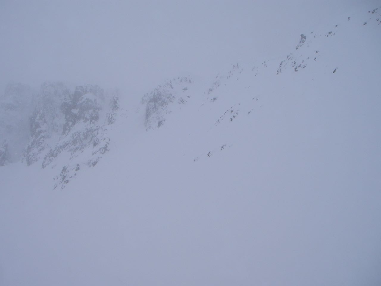 The lower part of the rim of the corrie - hard to see how much of a cornice has developed through the mirk