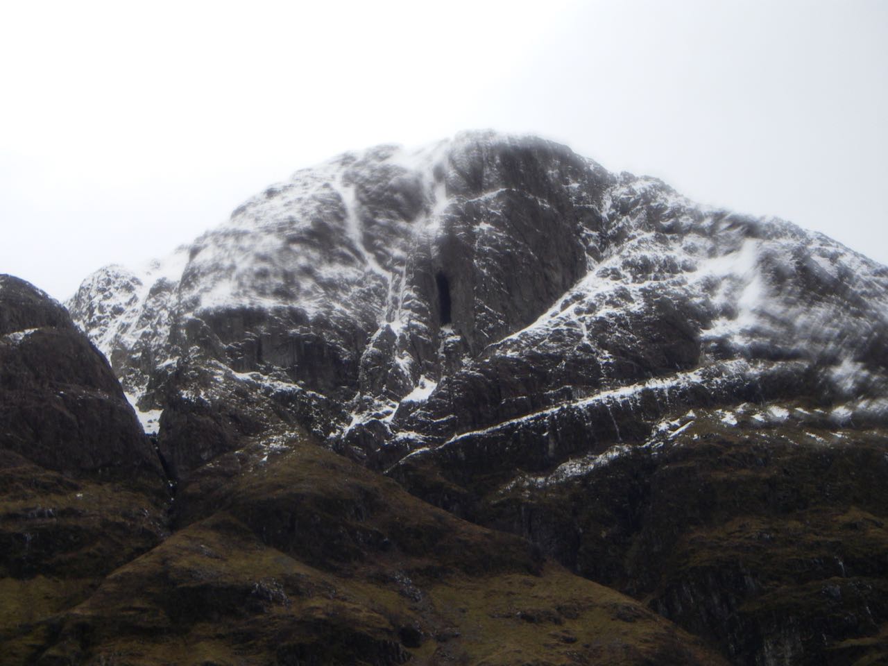 Ossians Cave on the formidable North face of Aonach Dubh