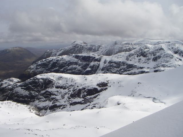 The 'stacked' ridges of the Glencoe hills-Gearr Aonach to Stob Dearg, in the distance.