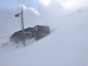 Strong Westerly winds transporting snow