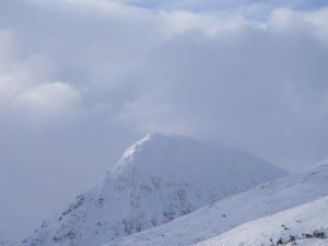 Cold, windy with a trace of new snow.