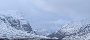 New snow and strong winds.